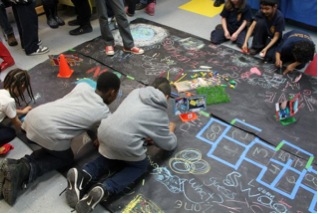 Figure 2. Participants occupying a mock parking space for play and creation during the “No Cars Go” lesson